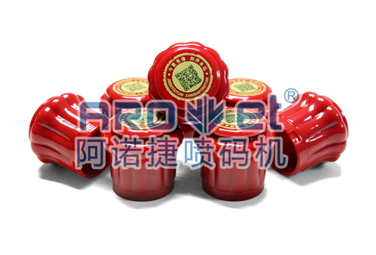 mg冰球突破瓶盖喷码机在瓶盖上喷印二维码